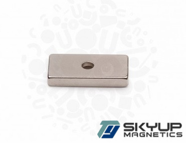 Block magnets with 1 counter sunk hole used in Electronics.motors ,generators.produced by professional magnets factory